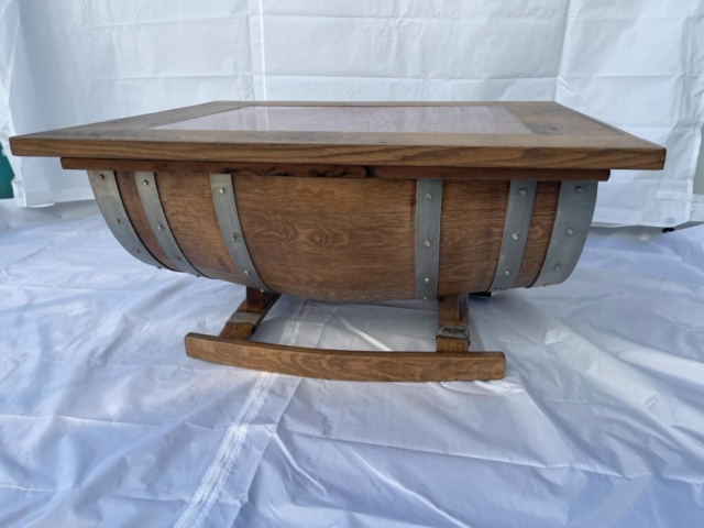 table made from whiskey barrel