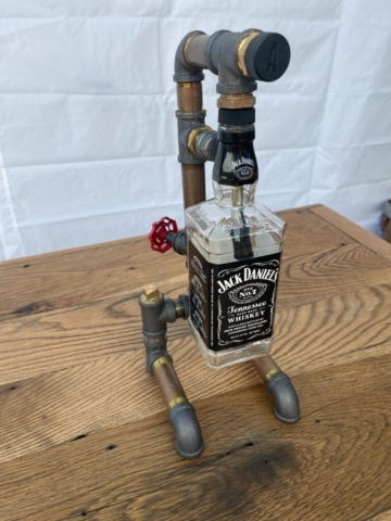 lamp made from bottle and pipe