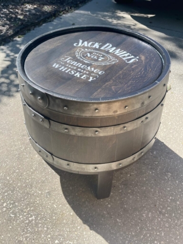 whiskey barrel side table with "Jack Daniel's" logo