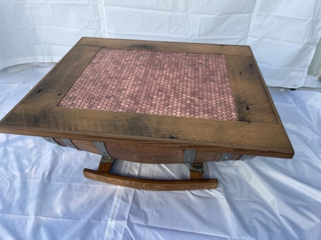 wooden table top with pennies