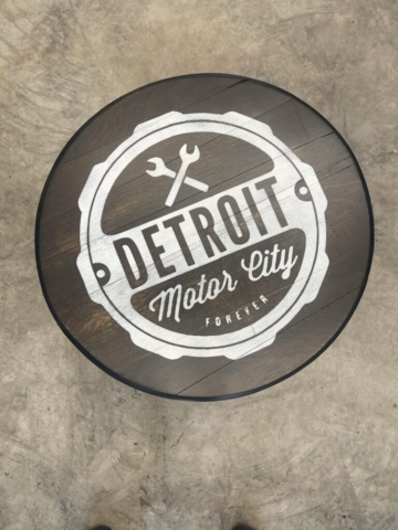 whiskey barrel table top with Detroit logo